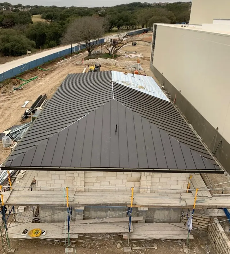 Metal roof new construction with scaffolding in Show Low